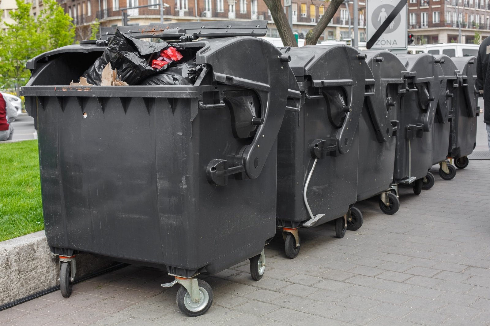 black-plastic-dumpster-street-large-garbage-containers.jpg